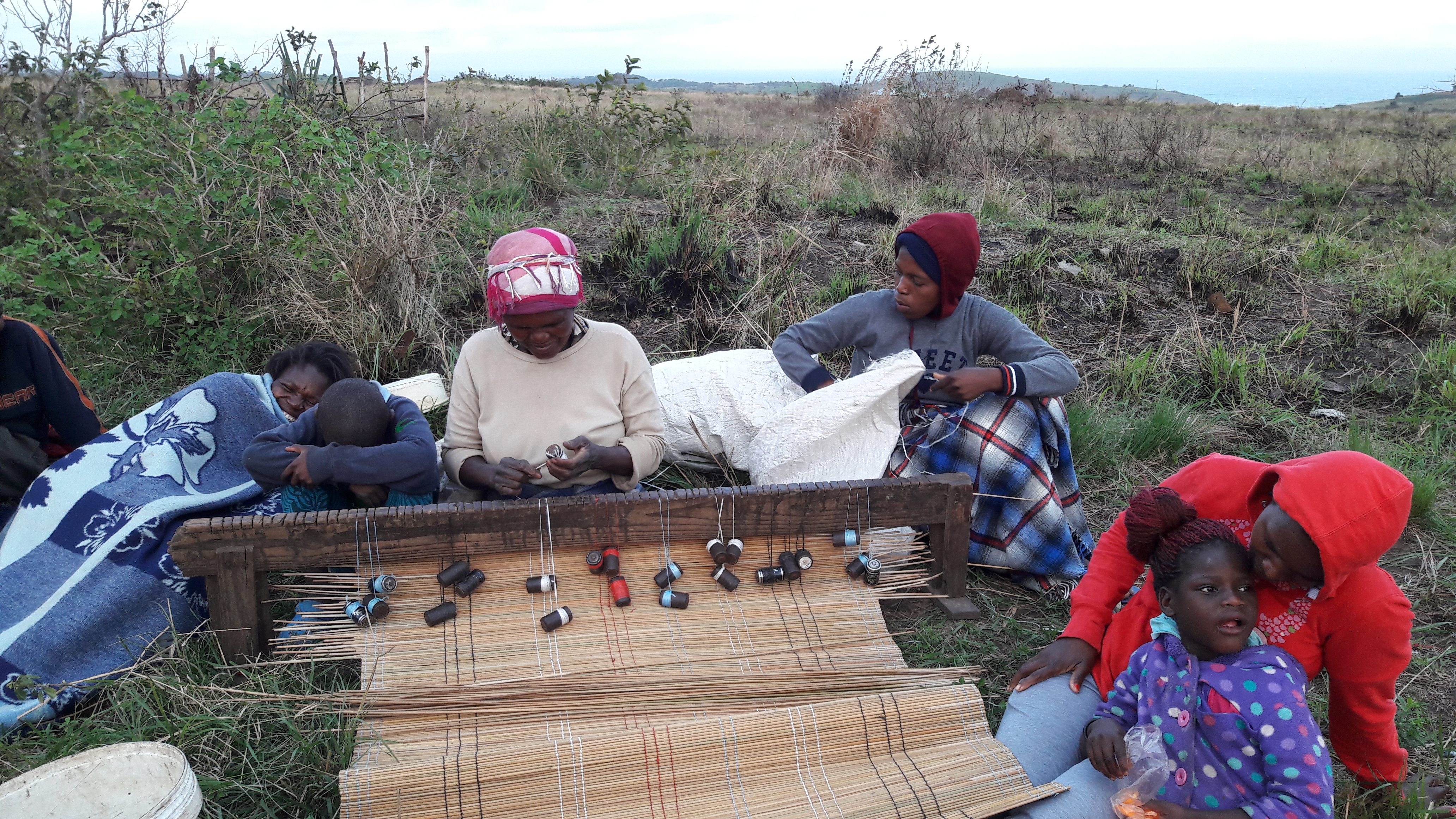 Community making mats in Amadiba during cover-19