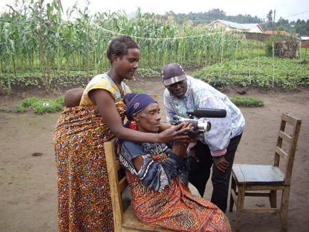 Batwa people learn how to use and handle digital equipment during the training.